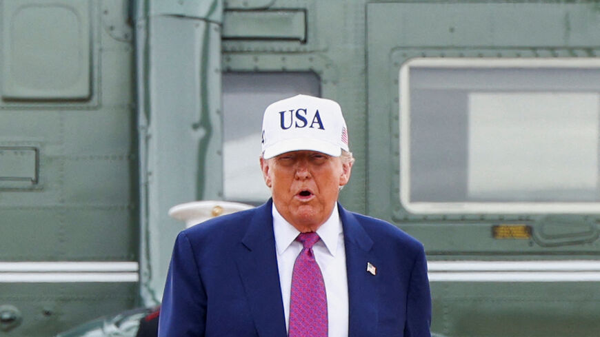U.S. President Donald Trump steps out of Marine One for a visit to Fort Bragg to mark the U.S. Army anniversary, in North Carolina, U.S., June 10, 2025. REUTERS/Evelyn Hockstein     TPX IMAGES OF THE DAY