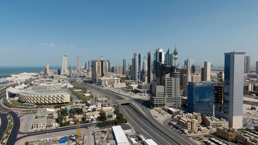 FILE PHOTO: A drone view shows Kuwait City, in the aftermath of strikes by Israel and the U.S. on Iran, in Kuwait, February 28, 2026. REUTERS/Stephanie McGehee/File Photo