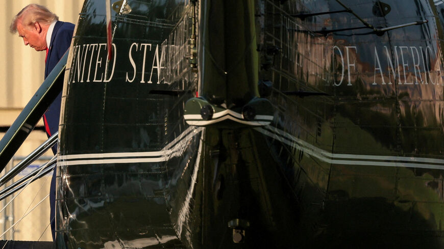 U.S. President Donald Trump disembarks Marine One, after traveling to Dover, Delaware and Marietta, Georgia, at the Ellipse near the White House in Washington, D.C., U.S., July 22, 2026. REUTERS/Kylie Cooper