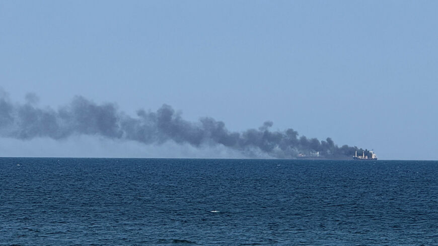 FILE PHOTO: Smoke rises from a civilian vessel on fire, amid Russia's attack on Ukraine, in Odesa, Ukraine July 19, 2026. Picture taken with a mobile phone. REUTERS/Stringer/File Photo