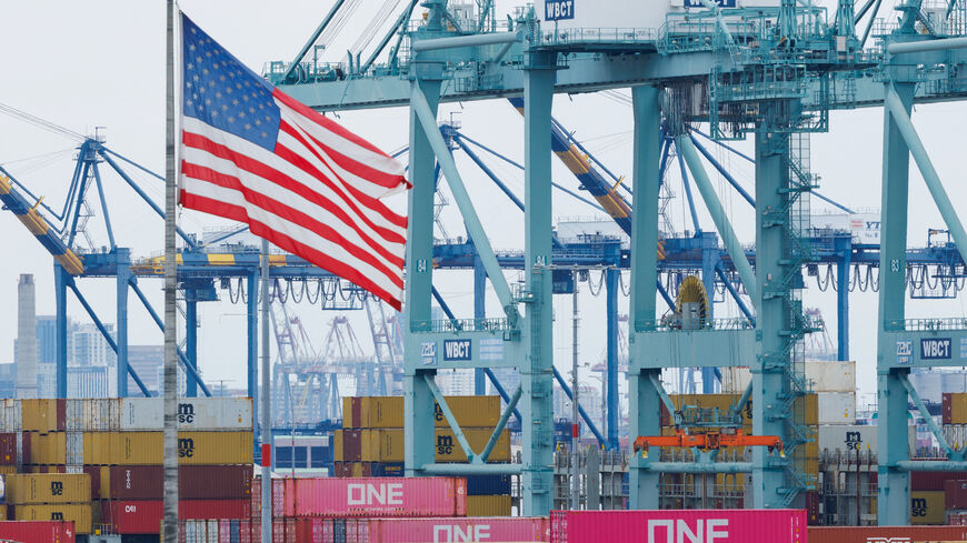 FILE PHOTO: Shipping containers from China sit at the Port of Los Angeles in San Pedro, California, U.S., November 5, 2025. REUTERS/Mike Blake/File Photo