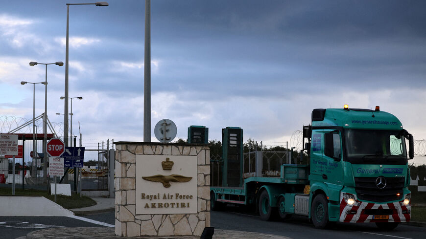 FILE PHOTO: A  truck exits RAF Akrotiri, a British sovereign base in Cyprus, March 24, 2026. REUTERS/Yiannis Kourtoglou/File Photo