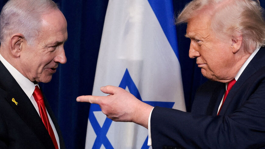 FILE PHOTO: U.S. President Donald Trump points his finger towards Israeli Prime Minister Benjamin Netanyahu during a press conference after meeting at Trump’s Mar-a-Lago club in Palm Beach, Florida, U.S., December 29, 2025. REUTERS/Jonathan Ernst/File Photo