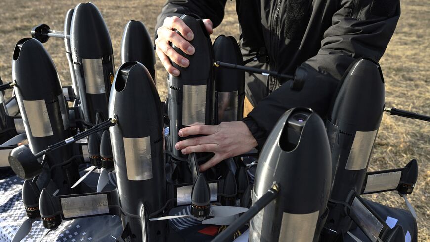 An employee of the Ukrainian SkyFall company checks a P1-Sun interceptor drone before a test flight at an undisclosed location in Ukraine on March 19, 2026,