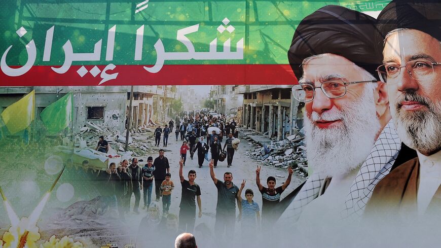 A giant billboard depicts late Iranian leader Ayatollah Ali Khamenei (2nd L), and his son Iranian Supreme Leader Ayatollah Mojtaba Khamenei, with Arabic writing that reads: "Thank you Iran," in Dahiyeh, Beirut's southern suburbs, on June 15, 2026. 