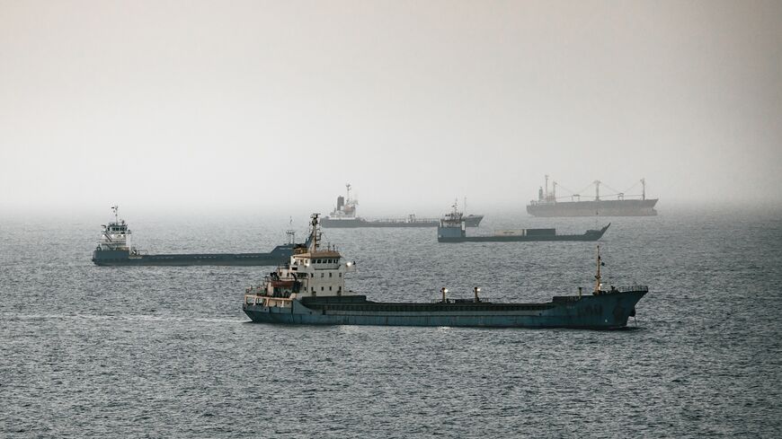 Crude oil tankers, bulk carriers and vessels sit anchored around Qaboos Port on June 22, 2026, in Muscat, Oman. 