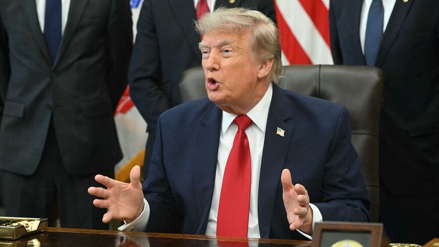 US President Donald Trump speaks after signing an executive order at the Oval Office of the White House in Washington, DC, on July 13, 2026. — SAUL LOEB / AFP via Getty Images