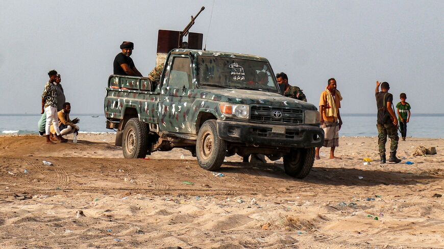 A pickup truck carrying a turret is pictured as fighters supporting the Aden-based and internationally recognized Yemeni government gather along the Red Sea shore in Khokha, in Yemen's western Hodeidah province on July 20, 2026.