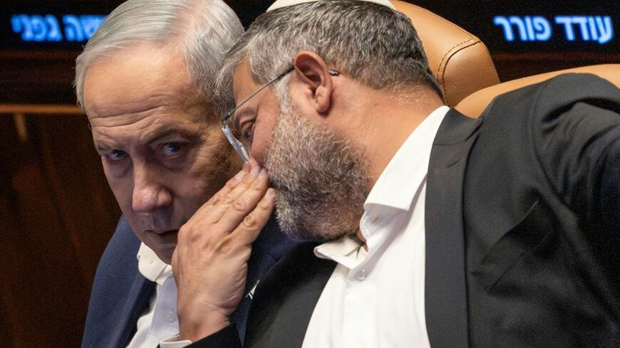 Israel's far-right national security minister Itamar Ben Gvir (right) speaks to Prime Minister Benjamin Netanyahu in parliament on July 16, 2026