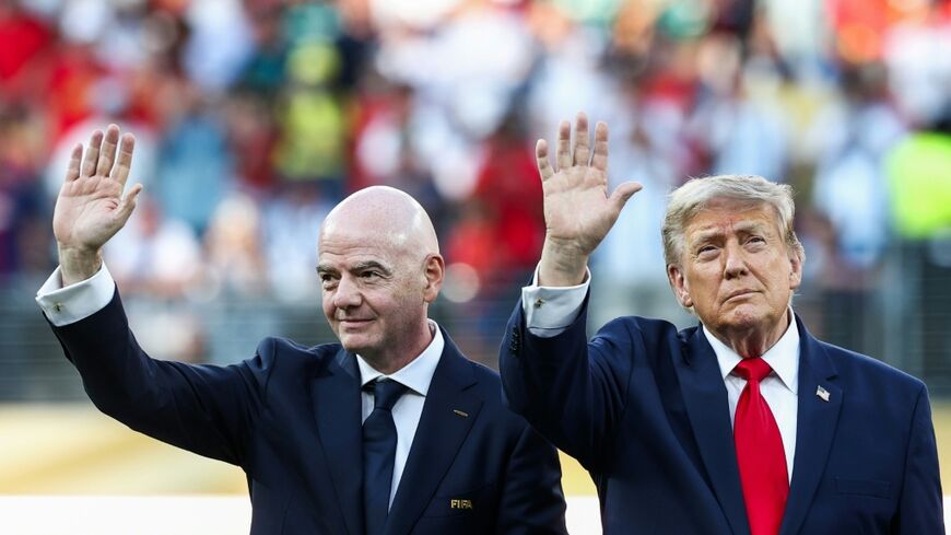 US President Donald Trump (R) and FIFA president Gianni Infantino at the 2026 World Cup