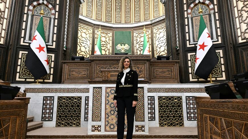 Syria's parliament deputy speaker Madonna Beshara poses inside the parliament in Damascus on July 27, 2026
