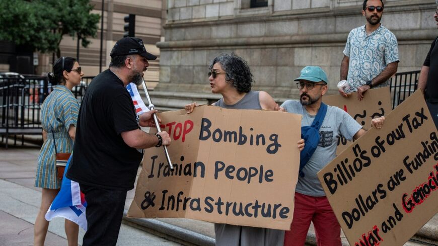 Protesters for and against the Iran war confront each other during a rally in the US city of Boston on Sunday