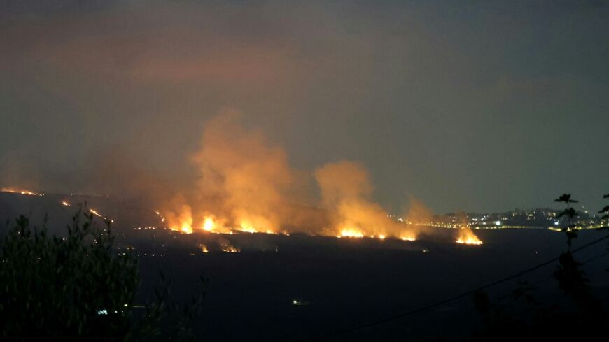 Smoke rises from fires ignited by Israeli shelling that targeted the plain of Marjayoun in southern Lebanon