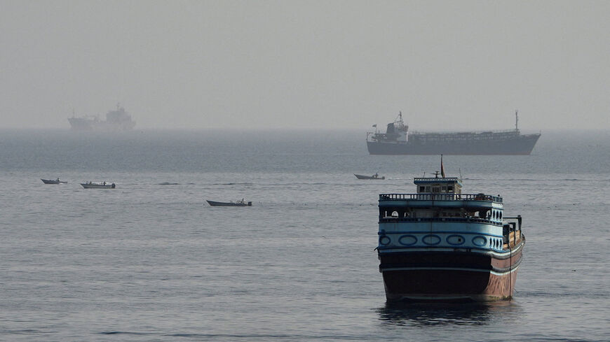 FILE PHOTO: Vessels in the Strait of Hormuz, as seen from Musandam, Oman, August 3, 2026. REUTERS/Stringer/File Photo