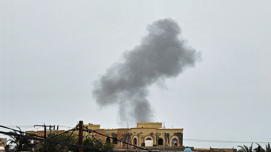 Smoke rises during Houthi missile and drone strikes on the Red Sea port city of Mocha, Yemen, August 9, 2026. Picture taken with a mobile phone. REUTERS/Stringer