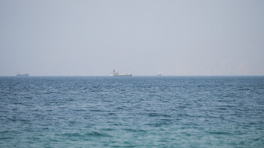 Vessels near the Strait of Hormuz, as seen from Musandam, Oman, August 6, 2026. REUTERS/Stringer