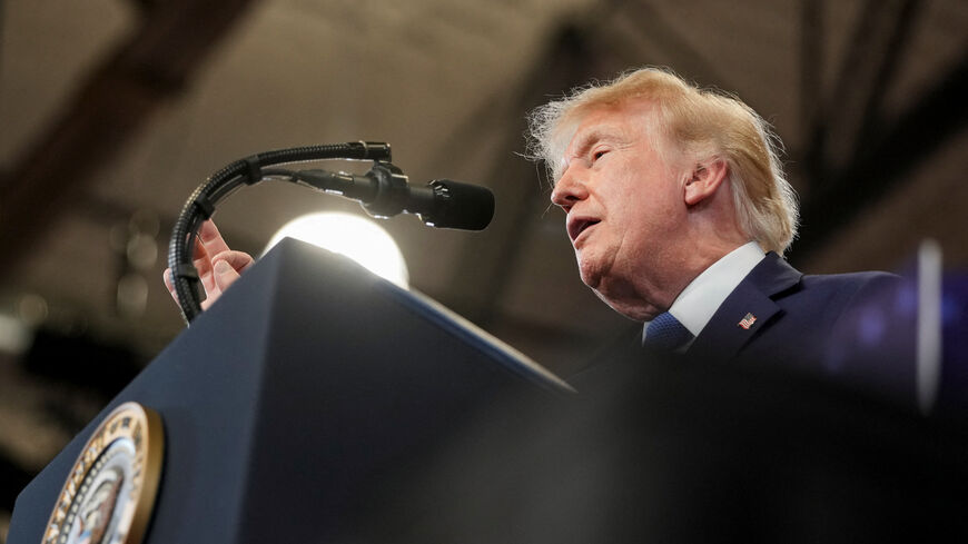 U.S. President Donald Trump delivers remarks at David S. Mack Center for Training and Intelligence in Garden City, New York, U.S., August 14, 2026. REUTERS/Ken Cedeno