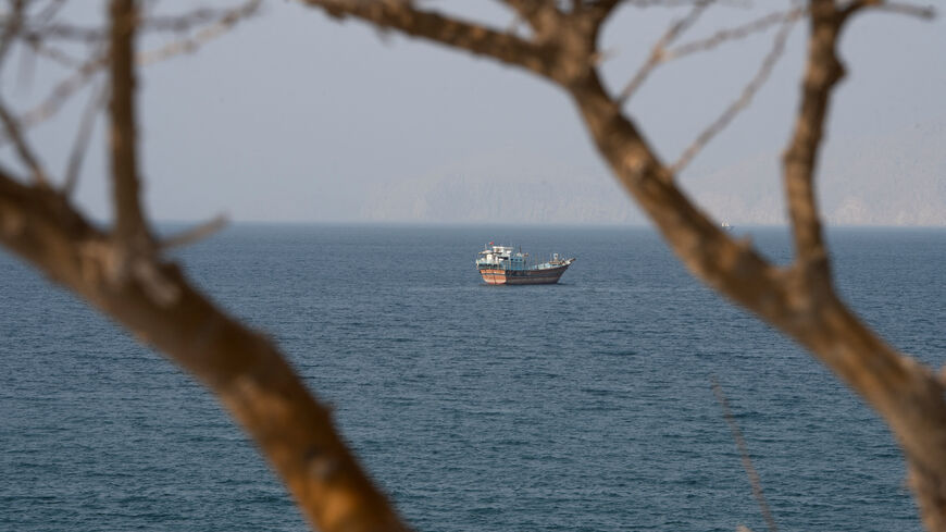 A vessel near the Strait of Hormuz, as seen from Musandam, Oman, August 17, 2026. REUTERS/Stringer