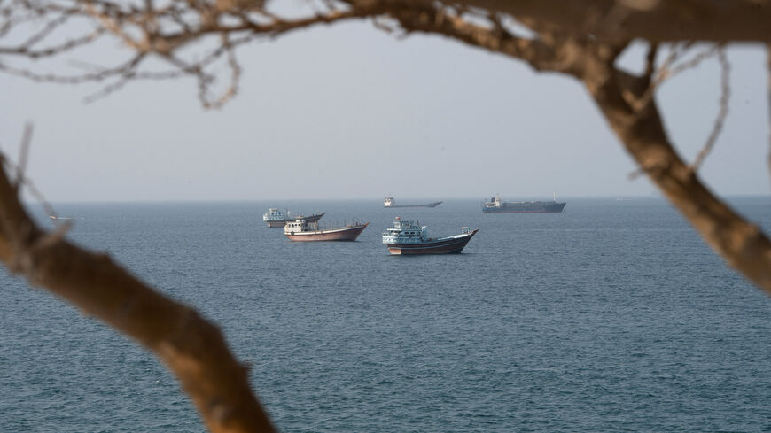 Vessels near the Strait of Hormuz, as seen from Musandam, Oman, August 17, 2026. REUTERS/Stringer