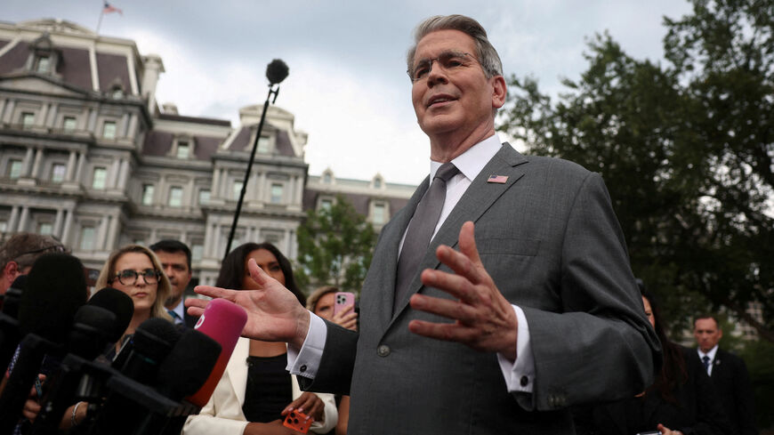FILE PHOTO: U.S. Treasury Secretary Scott Bessent speaks to reporters at the White House in Washington, D.C., U.S., August 20, 2026.  REUTERS/Kevin Lamarque/File Photo