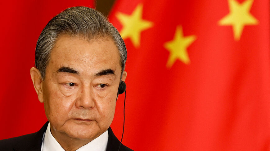 FILE PHOTO: Chinese Foreign Minister Wang Yi listens during a joint press conference with Indonesian Foreign Minister Retno Marsudi (not pictured) following their bilateral meeting in Jakarta, Indonesia, April 18, 2024. REUTERS/Willy Kurniawan/File Photo