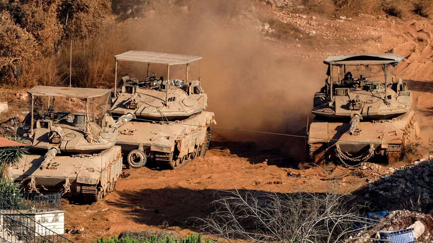Israeli battle tanks deploy in the village of Zawtar al-Sharqiyah (Eastern Zawtar) in southern Lebanon as pictured from the nearby village of Zawtar al-Gharbiyah (Western Zawtar) on August 2, 2026. Under a US-sponsored agreement signed in June, Lebanon's army is to disarm Hezbollah and the Israeli military is to withdraw from "pilot zones" where Lebanese forces will subsequently deploy. The deal came more than three months after Hezbollah drew Lebanon into the Middle East with rocket fire at Israel in suppo