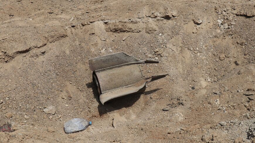 military projectile are embedded in the ground