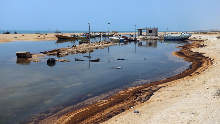 A photograph obtained from the Iranian Students’ News Agency shows an oil slick along the southern coast of Qeshm Island, Iran, August 13, 2026. 