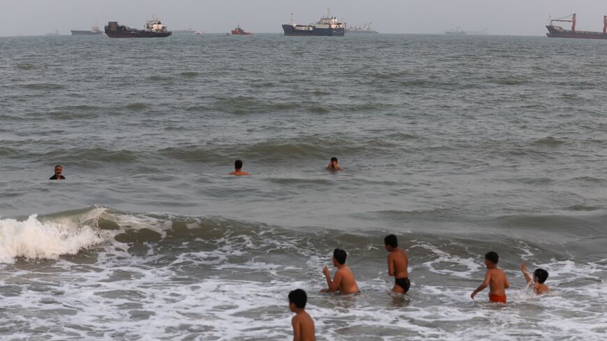 Children swimming in the Strait of Hormuz