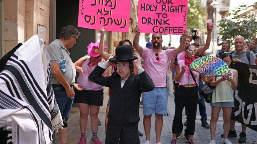 Ultra-Orthodox protesters demonstrate against Cafe Basimta operating on Shabbat, the weekly Jewish day of rest, as secular activists stage a counter-protest in support of the cafe, in central Jerusalem, on August 15, 2026
