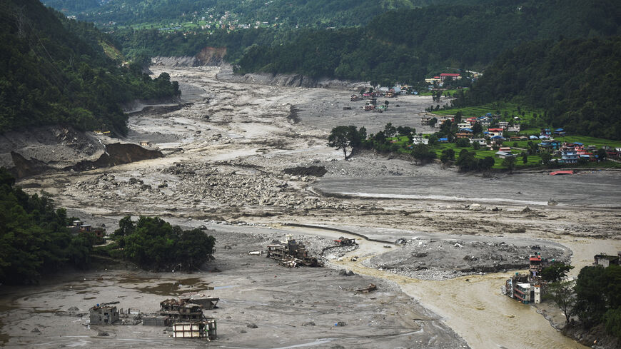 An arial view shows uildings near Trishuli River damaged and covered in mud following deadly flash floods and a mudslide, in Betrawati Bazaar in Rasuwa district, Nepal, August 30, 2026. REUTERS/Stringer