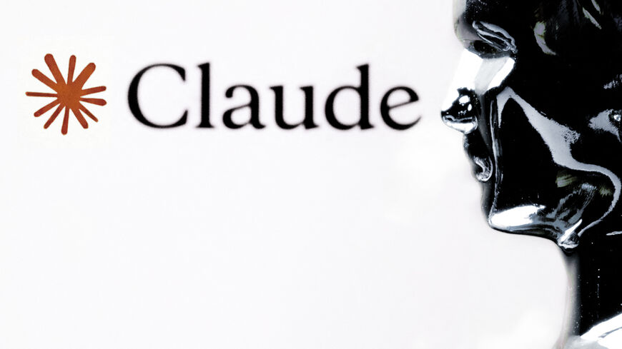  This photograph shows a figurine in front of the logo of the AI assistant "Claude" built by the US artificial intelligence safety and research company Anthropic, taken in Paris on Feb. 13, 2026. — JOEL SAGET / AFP via Getty Images 