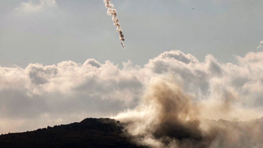 A flare fired by the Israeli military lands over the highlands of the area of Ali al-Taher as seen from nearby Marjayoun (Marjeyoun) in southern Lebanon on June 14, 2026.