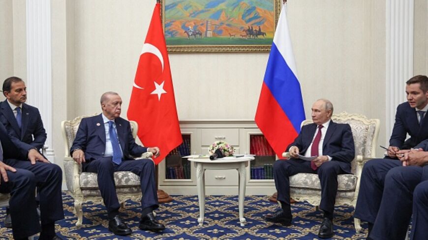 In this pool photograph distributed by the Russian state agency Sputnik, Russia's President Vladimir Putin and Turkey's President Recep Tayyip Erdogan hold a meeting on the sidelines of the Shanghai Cooperation Organisation (SCO) summit in Bishkek on September 1, 2026. (Photo by Kristina Solovyova / POOL / AFP via Getty Images)
