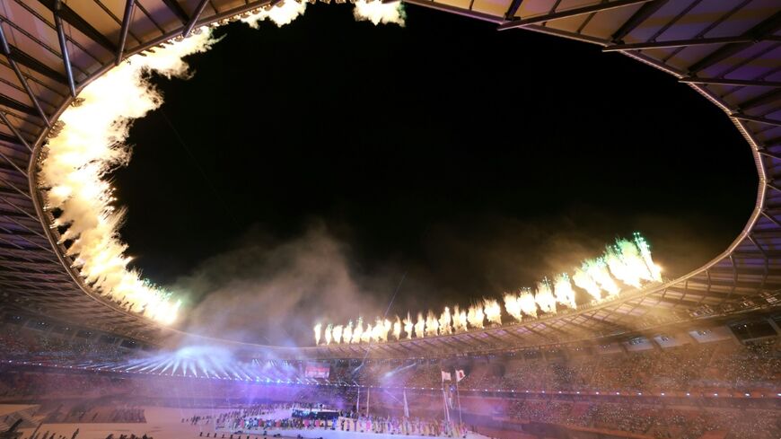 Fireworks illuminate the stadium at the end of the opening ceremony of the 2026 Asian Games at Paloma Mizuho Stadium in Nagoya on September 19, 2026. Doha is the next host and according to the current cycle, the Qatari capital would stage the Games in 2030.