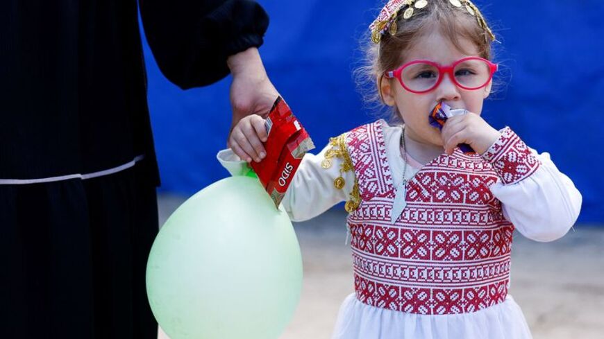 Families reunite with children who were evacuated from Gaza as premature babies, in Gaza Strip