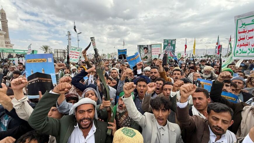 FILE PHOTO: Houthi supporters rally to celebrate advances by Houthi forces along the Red Sea coastline, in Sanaa