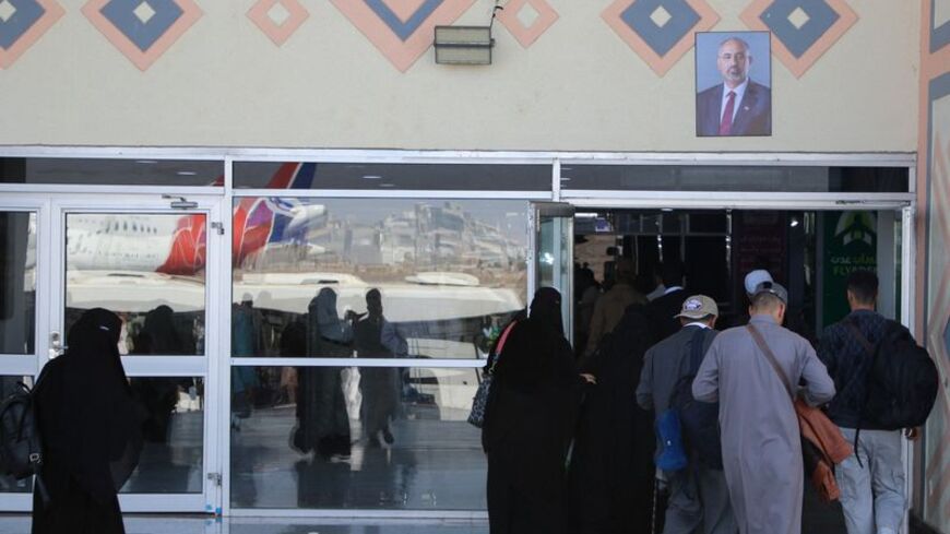 Passengers walk at the arrival lounge of Aden Airport in Aden