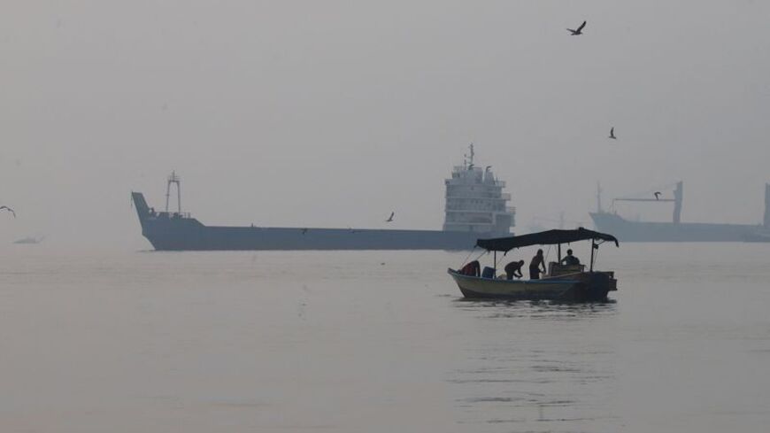 Vessels in the Strait of Hormuz near the beach of Bandar Abbas