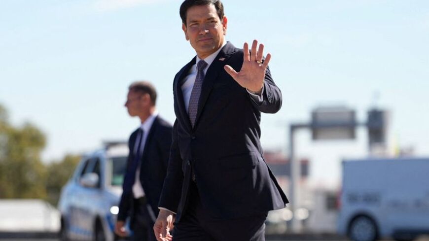 US Secretary of State Marco Rubio steps off a plane at Lisbon Airport