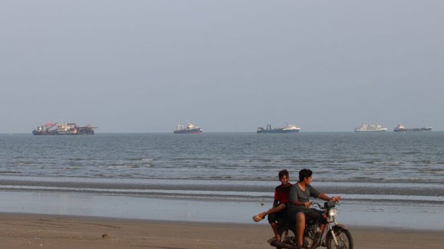 Vessels in the Strait of Hormuz near the beach of Bandar Abbas