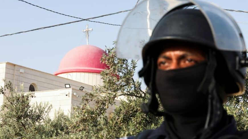 The grounds of Saint George’s Greek Orthodox Church, where gunmen opened fire during a funeral the previous day, in the village of Hamoud