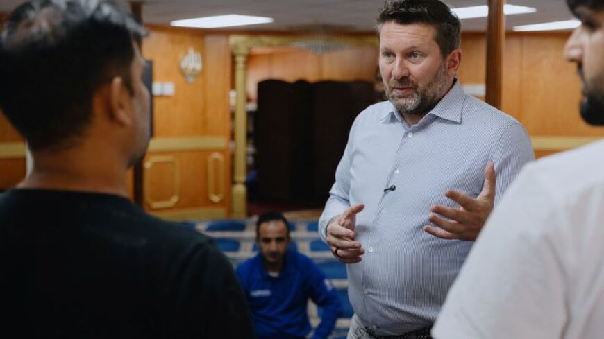 FILE PHOTO: AfghanEvac founder and President Shawn VanDiver answers questions from local Afghan Americans during a town hall meeting held by AfghanEvac at the Abu Hanifa Mosque in Richardson, Texas, U.S.