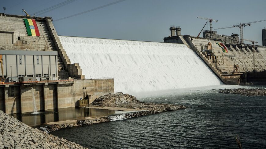 This general view shows the site of the Grand Ethiopian Renaissance Dam (GERD) in Guba, Ethiopia, on February 19, 2022. - Ethiopia's massive hydro-electric dam project on a tributary of the Nile has raised regional tensions notably with Egypt, which depends on the huge river for 97 percent of its water supply. Government officials said the dam would begin producing electricity on Sunday, more than a decade since work first started. (Photo by Amanuel SILESHI / AFP) (Photo by AMANUEL SILESHI/AFP via Getty Ima