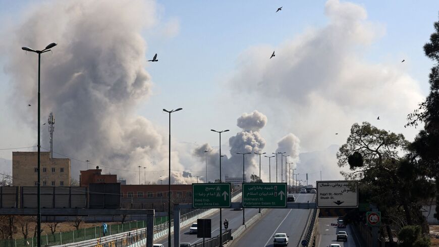 smoke rising after a strike on the Iranian capital of Tehran