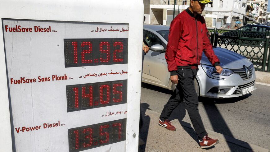 Fuel prices are displayed at a petrol station in Rabat