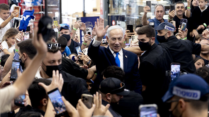 Israeli Prime Minister and Likud Party leader, Benjamin Netanyahu greets supporters during a campaign event at a mall ahead of Israel's general elections scheduled for next week on October 18, 2026 in Yoqne'am Israel. Israel will hold legislative elections on October 27, 2026. (Photo by Amir Levy/Getty Images)