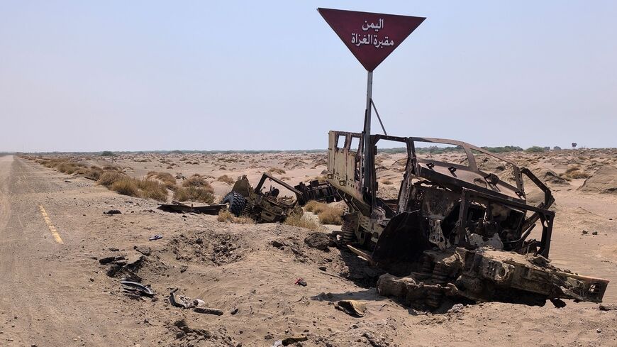 Destroyed military vehicles reportedly belonging to Saudi-backed forces