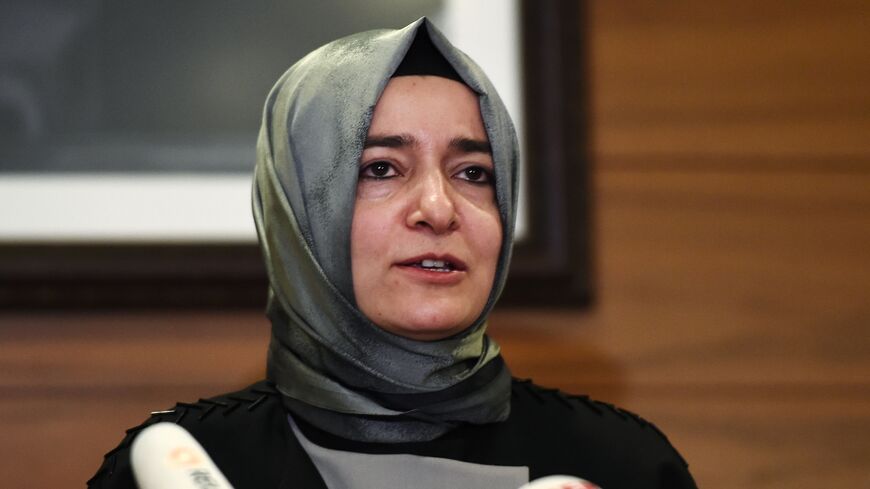 Turkey's Family Minister Fatma Betul Sayan Kaya speaks to media after arriving at the Ataturk International airport on March 12, 2017, in Istanbul. 