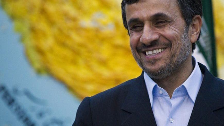 EDITORS' NOTE: Reuters and other foreign media are subject to Iranian restrictions on leaving the office to report, film or take pictures in Tehran.
Iranian President Mahmoud Ahmadinejad jokes with journalists as he waits to meet with India's Minister for New and Renewable Energy Farooq Abdullah (not pictured) in Tehran March 4, 2012.  REUTERS/Caren Firouz   (IRAN - Tags: POLITICS ENERGY)